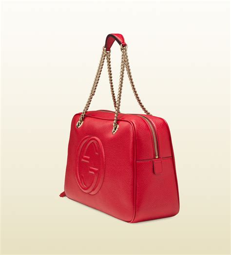 red gucci disco bag with gold chain